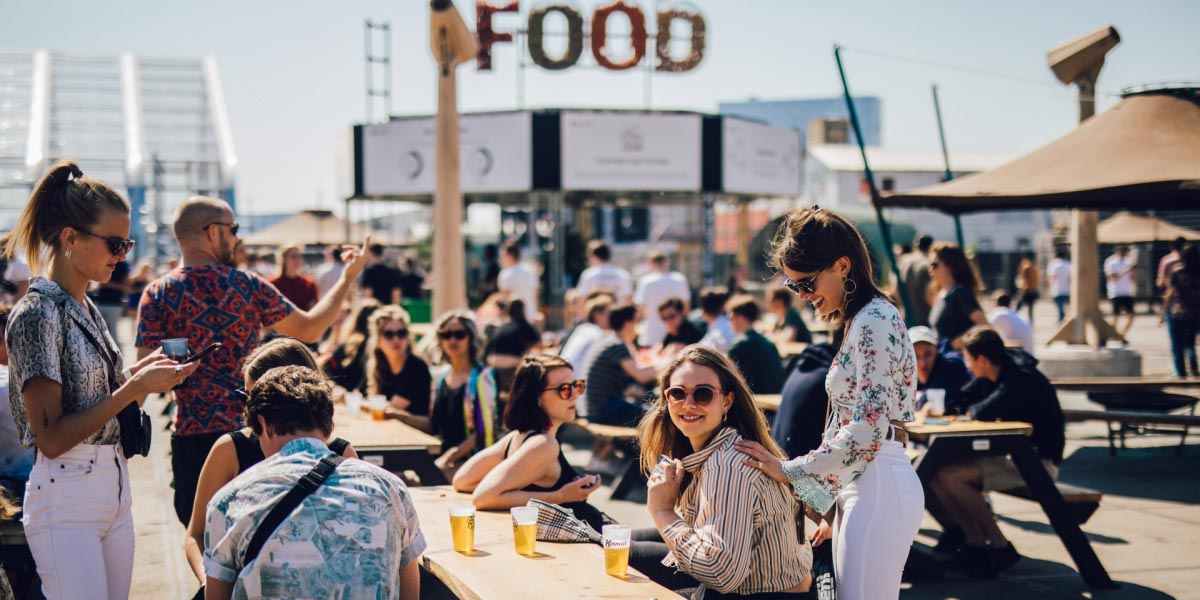People having drinks and food during DGTL Festival Amsterdam 2019